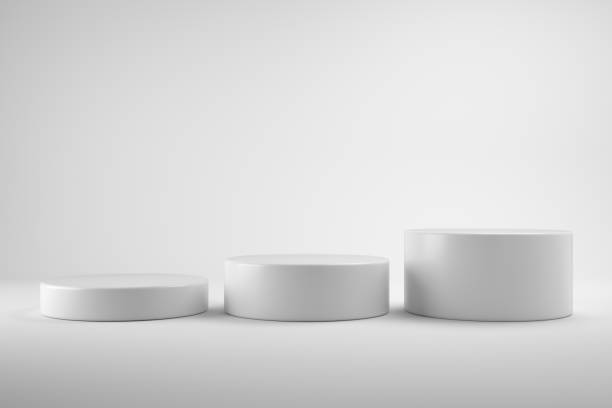 istock Modern Platform stand podium display on white room background. 
for empty product shelf or exhibition stage backdrop. 3D rendering. 1402291192