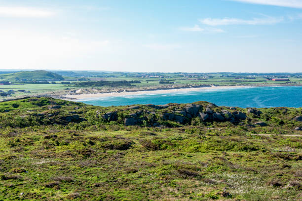 istock A distant view to beautiful long Hellestostranden white sand beach while hiking along the North sea coast 1402294604