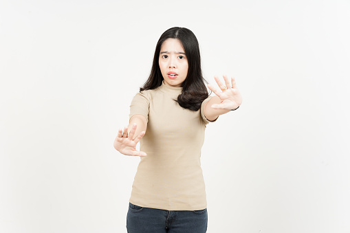 Rejection Hand Gesture Of Beautiful Asian Woman Isolated On White Background