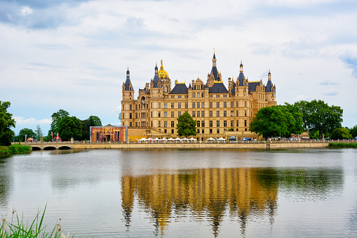 The Schwerin Palace (Schweriner Schloss) seen from the waterside located in the city of Schwerin, Germany
