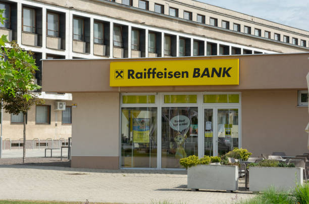 The yellow banner of Raiffeisen bank branch in Slovakia. stock photo