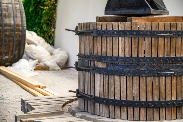 istock Wooden industrial grape crusher vineyard. 1402299898