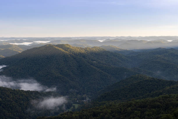istock Early Morning Sunrise and Mountains 1402303981