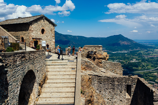 Sant'Ambrogio di Torino, Italy - May, 26 2022:  Tourists at the monastery of Sacre di San Michele on a hilltop west of Turin, Italy.