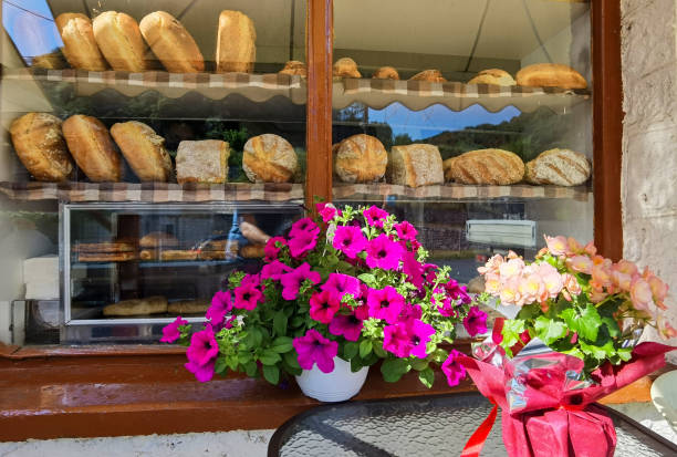 istock bakery frontstore with breads and flowers on the table 1402305169