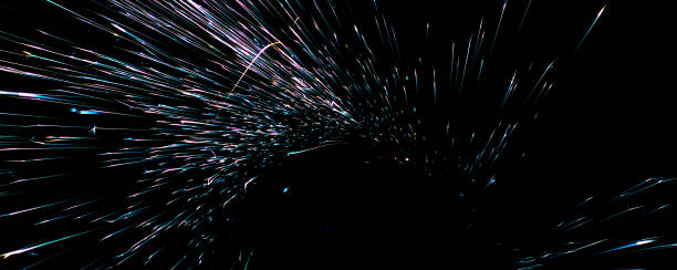 istock sparks in the dark. lines of light. 1402305470