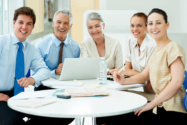 istock Happy business people in a meeting 140230677