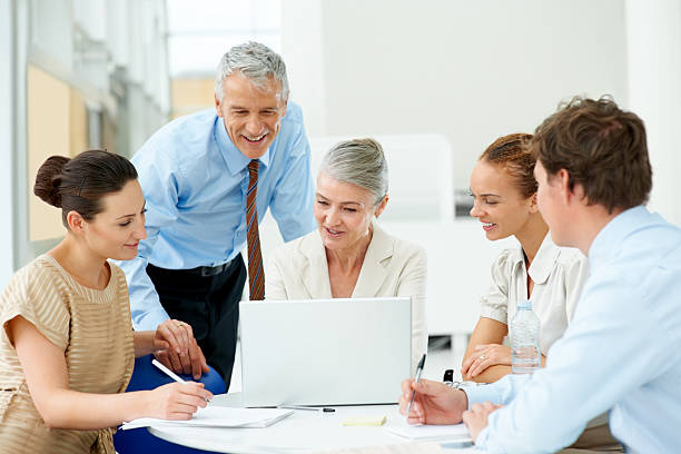 istock Business people discussing new project in meeting 140230682