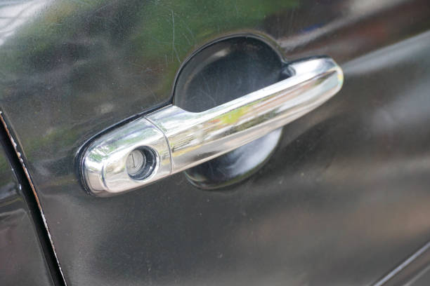 istock Black car door handle. With a few light scuffs. 1402307449