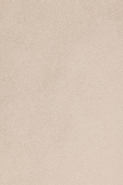 istock Part of a textured beige wall 1402307491