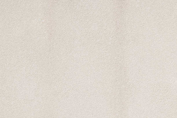 istock Part of a textured cream wall 1402307492