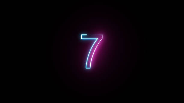 istock Neon number 7 on black background. Seven. 1402307653