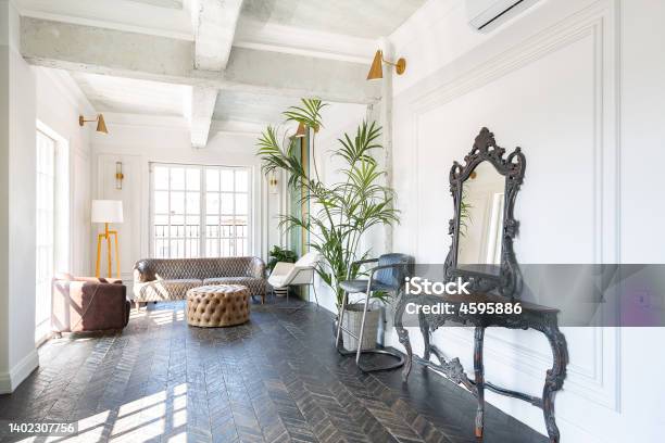 Chic Luxurious Guest Room Design With Oldfashioned Antique Furniture White Walls Are Decorated With Relief There Is A Beautiful Dark Brown Parquet On The Floor Stock Photo - Download Image Now