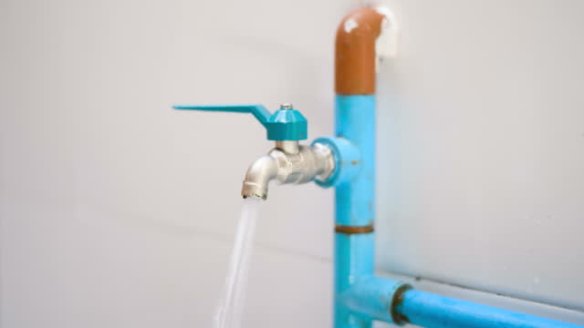 Time lapse of Plumber repairing the faucet
