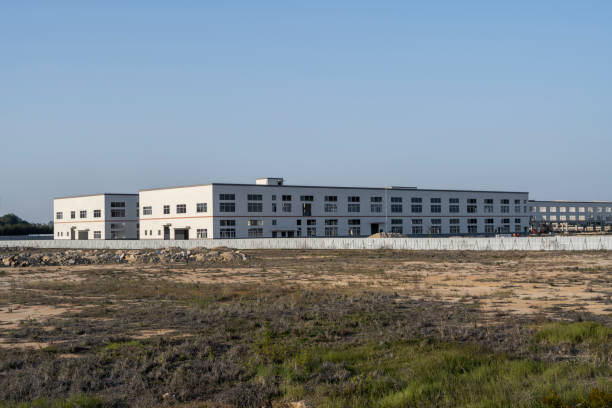 istock Empty grassland in front of the plant 1402314054