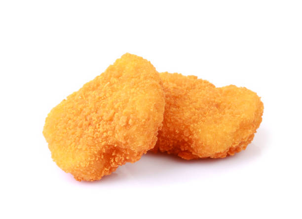 istock Chicken nuggets closeup isolated 1402314406