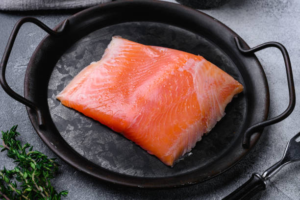 istock Fresh fish. Salmon fillet set, on gray stone table background 1402316996