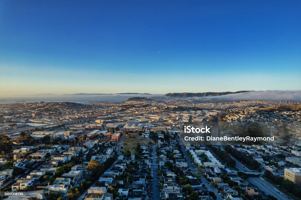 Aerial View of Fog over South  San Francisco An aerial view of fog moving in over south San Francisco. The 101 and 280 freeways are visible in the morning light. San Francisco - California Stock Photo