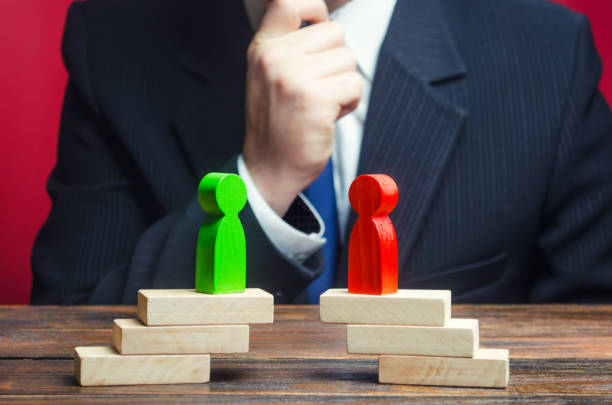 istock A businessman is studying the negotiation process and rivalry parties. Truce agreement. Candidates Political Debate. civilized resolution disputes, search for compromise. Establishing contact. 1402324291