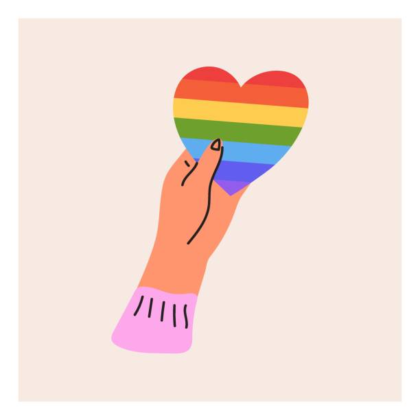 istock The hand holds the LGBT heart. Pride month, LGBT flag, rainbow. Flat vector illustration 1402328007