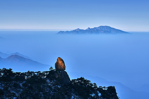 Huangshan mountain (Feilai stone) on cloud-sea at sunrise, China.
