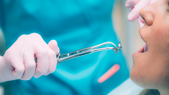 Endodontics – Endodontist Preparing Instruments for Root Canal Treatment in Dental Clinic.