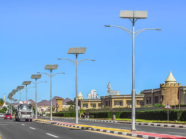 Row of solar panels on the street in Sharm El Sheikh Sharm El Sheikh, Egypt - January 22, 2020: Row of solar panels on the street in Sharm El Sheikh. Cityscape in Egyptian tourist town solar street lights stock pictures, royalty-free photos & images