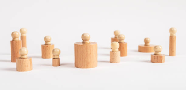 istock Montessori knobbed cylinders placed in random order. Puzzle pieces of different diameter and height. Wooden game for teaching children to visually discriminate between dimensions 1402336503