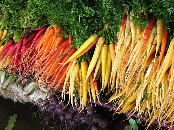 istock Multi-colored carrots at farmers' market 140233781