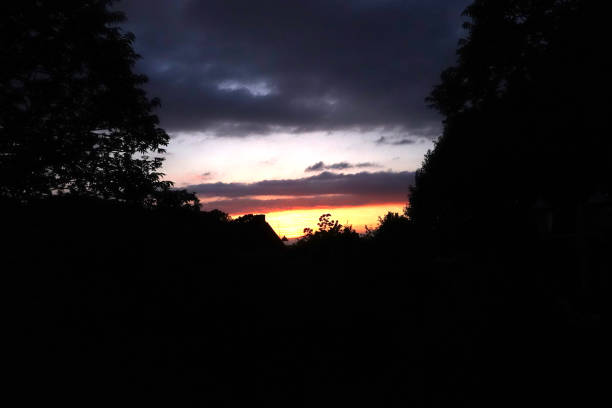 istock Sunset over a countryside village 1402338731