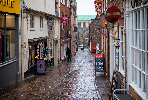 A wet day in St Andrew’s Hill, one of the oldest parts of the city of Norwich, Norfolk, Eastern England.