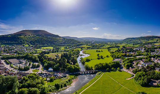 Aerial view of the River Usk and rural Welsh town of Abergavenny, Monmouthshire