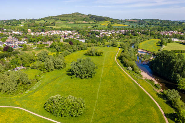 aerial view of the river usk and rural welsh town of abergavenny - river usk imagens e fotografias de stock