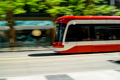 Toronto streetcar in blurred motion.