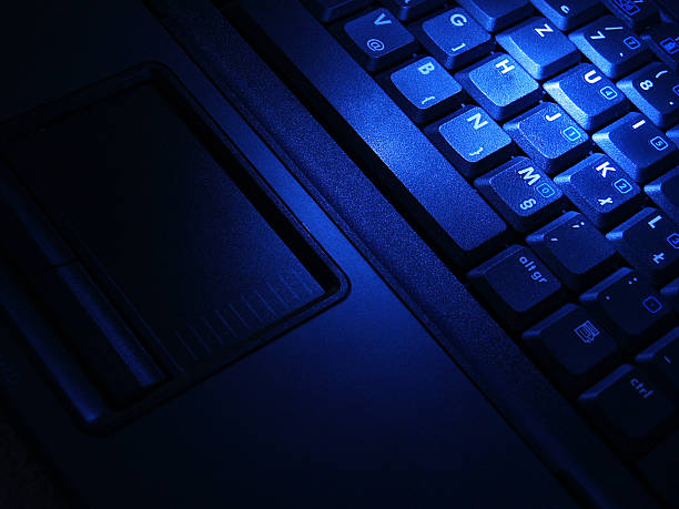 istock A blue laptop keyboard at night 140234115