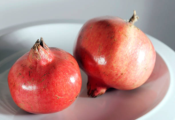 yummy natural pomegranates stock photo