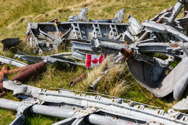 Wreckage of a Royal Canadian Air Force Wellington bomber (R1465) on a remote Welsh hillside.