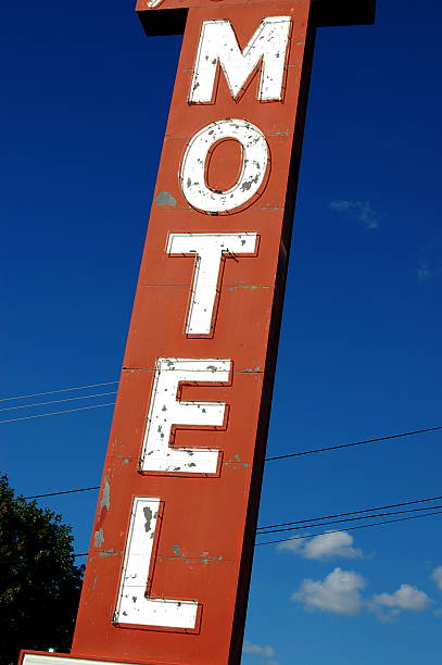 Large red and white neon motel sign stock photo