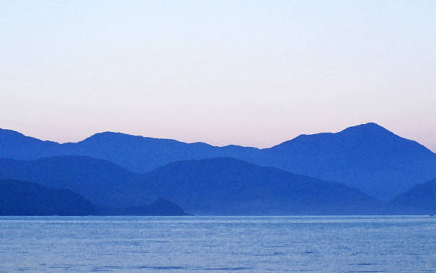istock Blue Mountain Silhouettes, Ubatuba, Brazil (Brasil) 1402342540