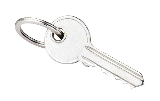 House key isolated on white background, modern new key