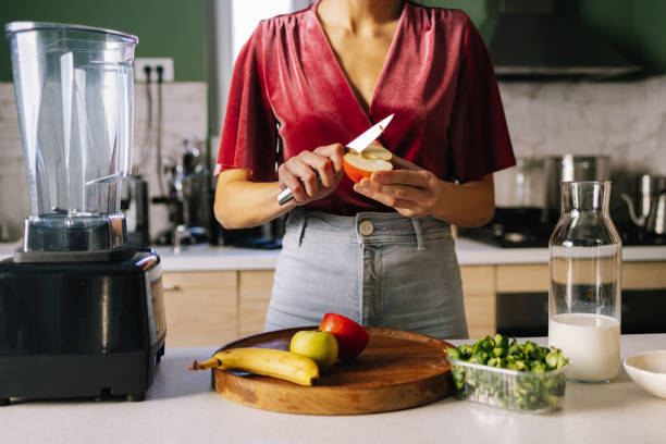 istock Woman Preparing A Healthy Snack 1402344988