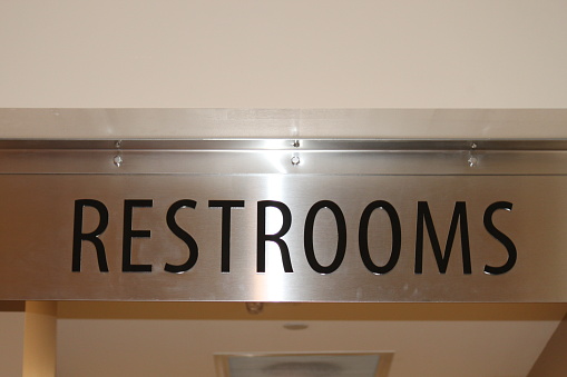 Restrooms sign.