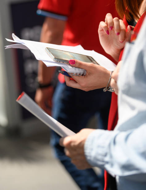 istock Woman checking the data on her cell phone 1402346237