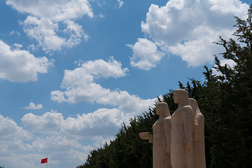 Ankara, Turkey-May 18, 2022: A statue group of women representing solemnity, pride and determination stands near the Independence Tower at the Ataturk Memorial in Ankara.