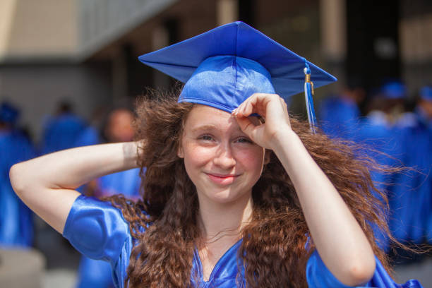 Middle-school student, a teenage girl, getting graduated.