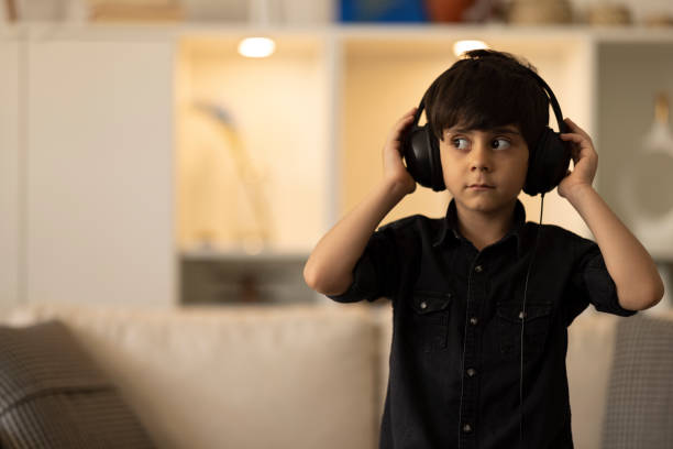 istock Child Rocking Out to Music 1402350864