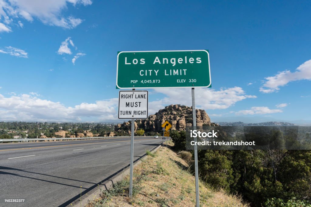 Los Angeles City Limit Sign on Topanga Canyon Blvd Los Angeles city limit sign on Topanga Canyon Blvd - State Route 27 in Chatsworth, California.  Stoney Point park is in background. City Limit Sign Stock Photo