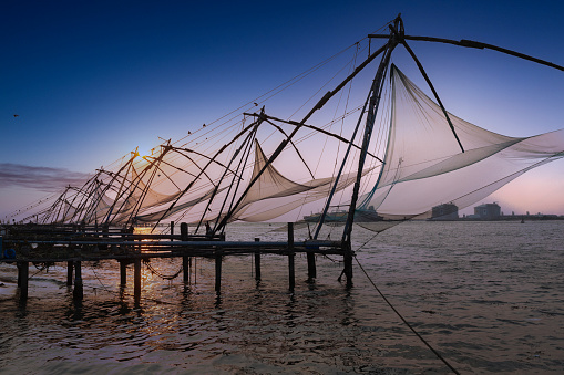 Kochi chinese fishnets in twilight, Kerala. Fort Kochin, Kochi, Kerala, south India