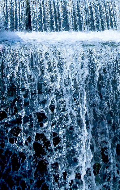 Waterfall in blue and white on a black background
