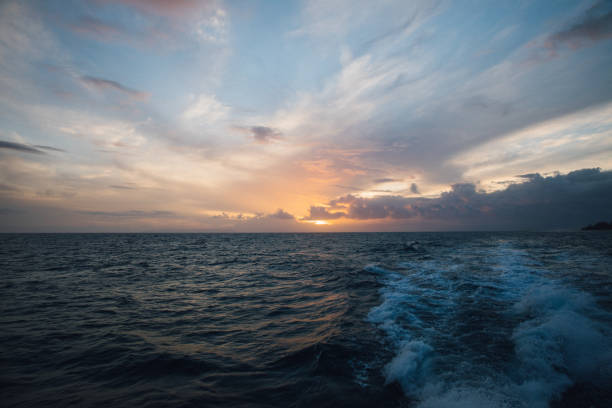 istock Sunset over the Ocean in Kauai 1402359199